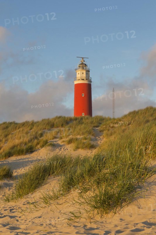Eierland Lighthouse in the dunes on the northernmost tip of the Dutch island of Texel