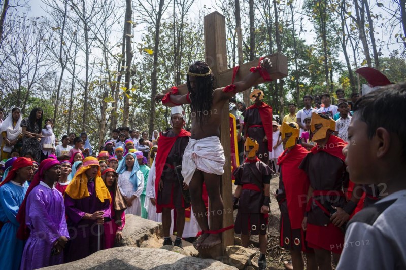 Christian devotees during the annual Good Friday procession to re-enact the crucifixion of Jesus Christ on April 7