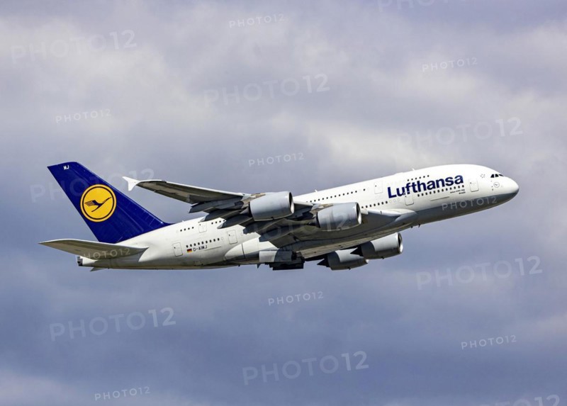 Airbus A380-800 of the airline Lufthansa during take-off at Fraport Airport
