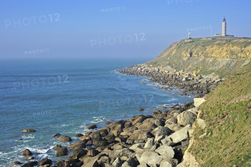 Lighthouse and sandstone boulders from cliff on beach at Cap Gris Nez