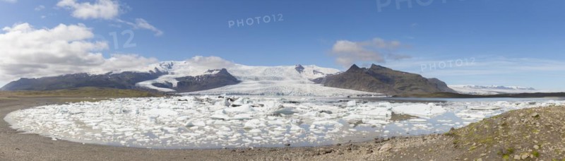 View over the glacier lake Fjallsarlon and Icelandic glacier Fjallsjoekull