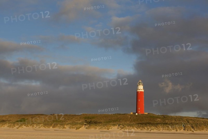 Eierland Lighthouse in the dunes during stormy weather on the northernmost tip of the Dutch island of Texel