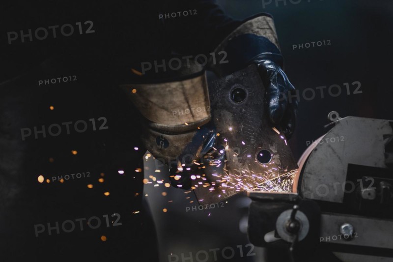A piece of metal being ground