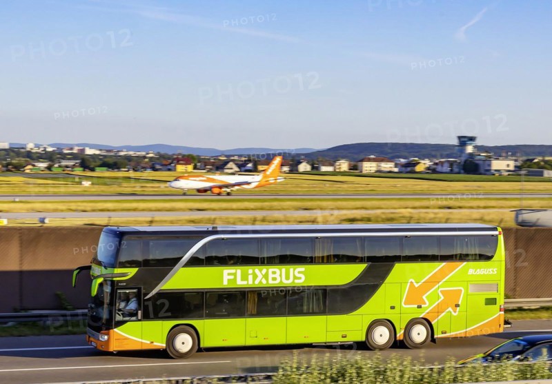 Flixbus on the road on the A8 motorway at the airport