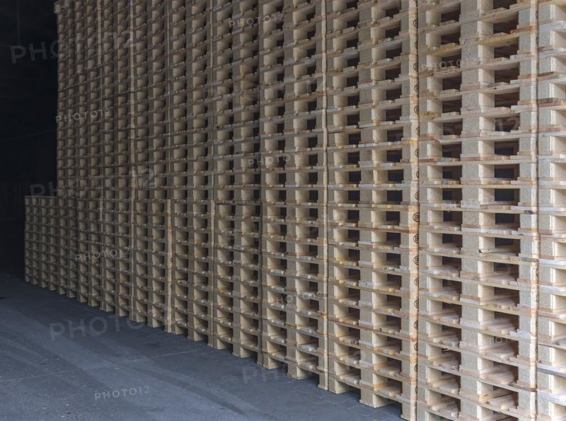 Stacked euro pallets in a former paper factory