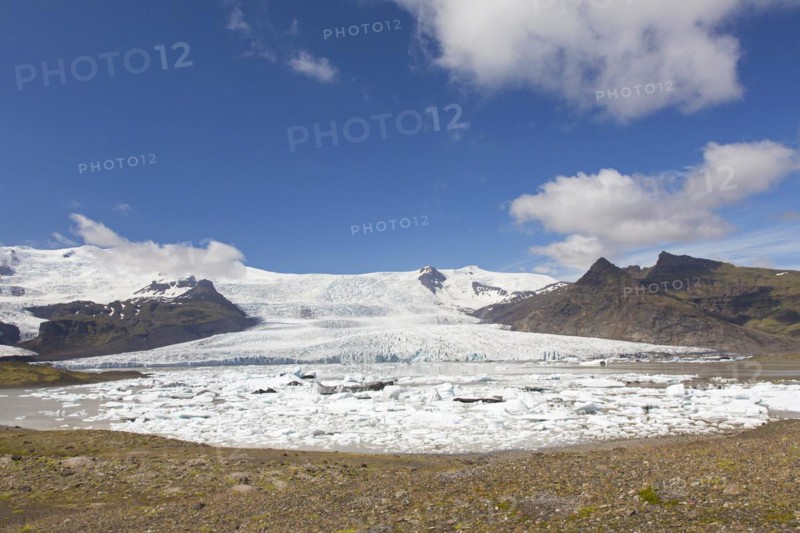 View over the glacier lake Fjallsarlon and Icelandic glacier Fjallsjoekull