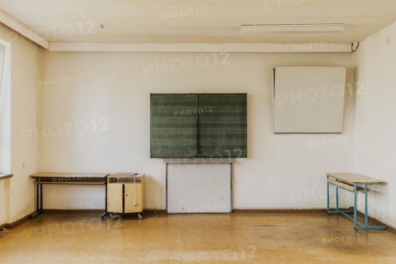 A blackboard in an empty classroom of the old primary school in Trinwillershagen