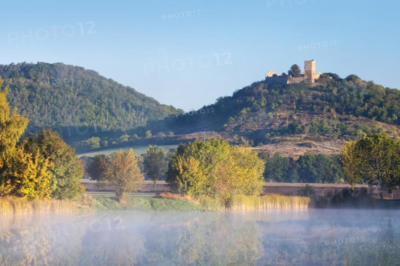 Landscape with lake with morning mist in autumn
