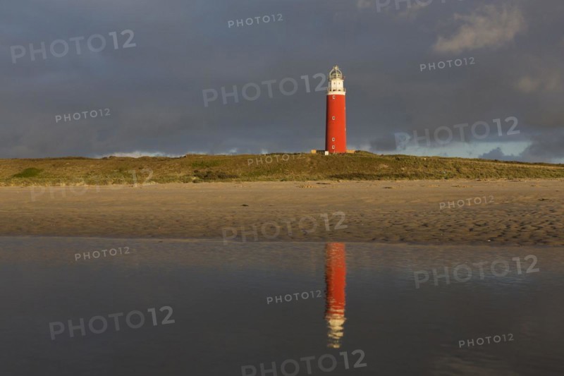 Eierland Lighthouse in the dunes during stormy weather on the northernmost tip of the Dutch island of Texel