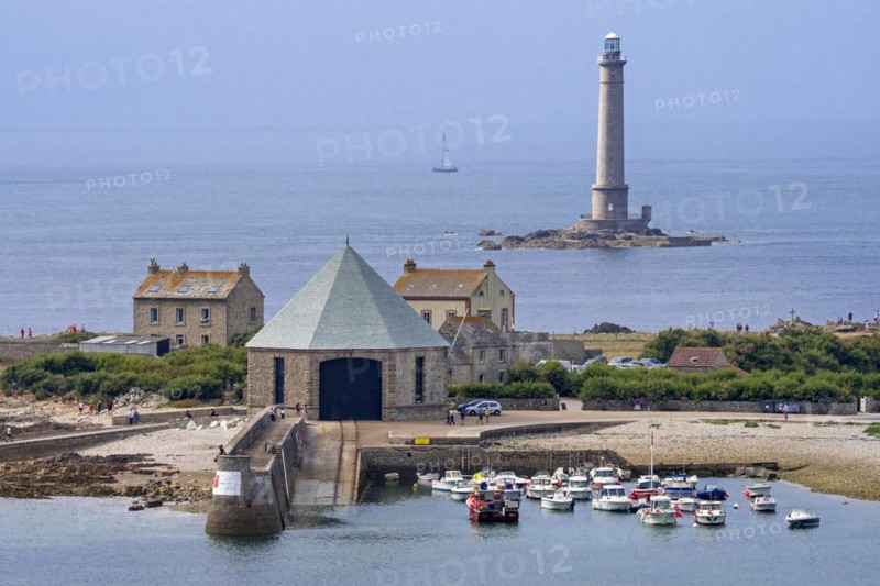 Phare de Goury lighthouse and lifeboat station in the port near Auderville at the Cap de La Hague