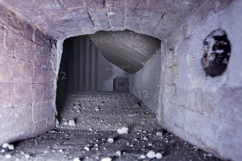 View into the boiler room of an industrial boiler of a former paper factory