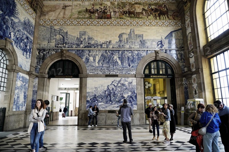View of azulejos on walls of ornate interior of Arrivals Hall at Sao Bento Railway Station in Porto