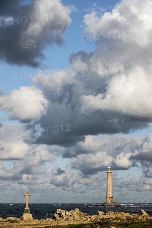 Lighthouse at the Cap de La Hague and monument in honor of the French Vendemiaire submarine crew
