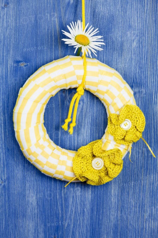 Decorative wreath on blue background