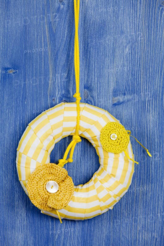 Decorative wreath on blue background