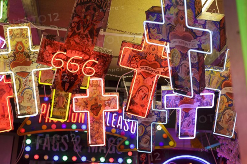 Room full of bright colourful neon signs