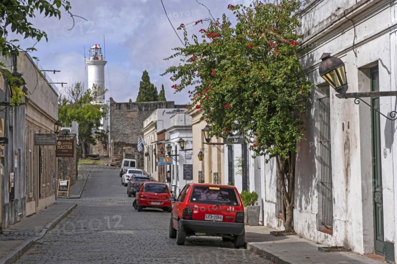 Cobbled street and lighthouse in the colonial Barrio Historico