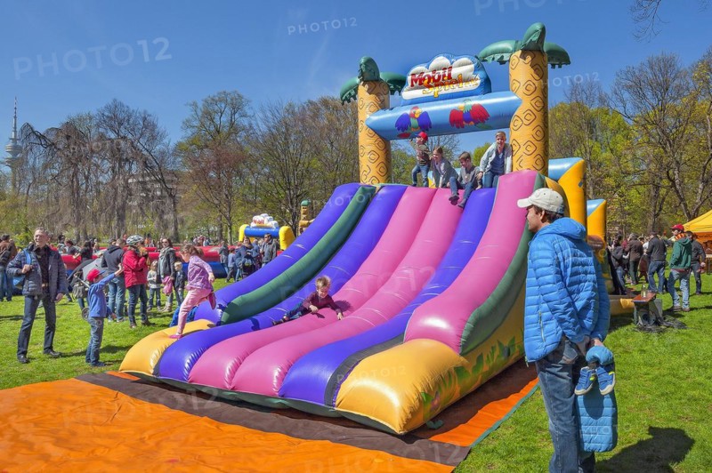 Inflatable plastic slide in springtime Luitpoldpark