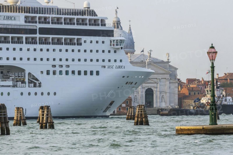 A cruise ship is heading for the Stazione Marittima cruise terminal. Meanwhile