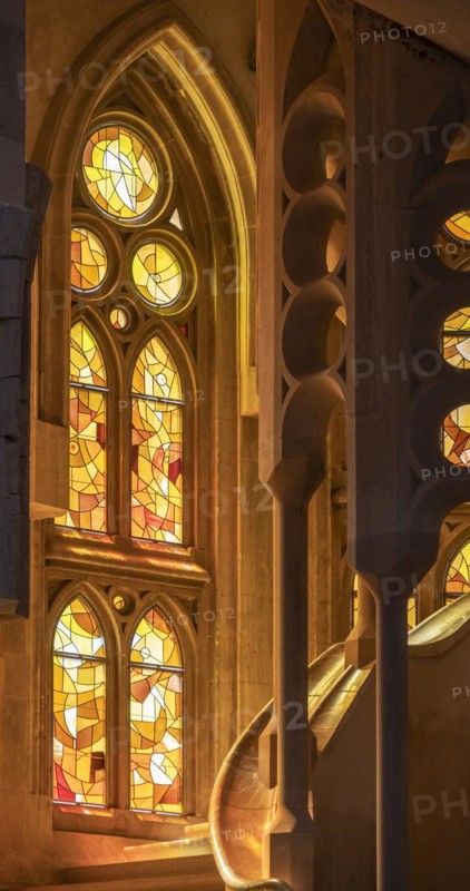 Spiral staircase and stained glass windows