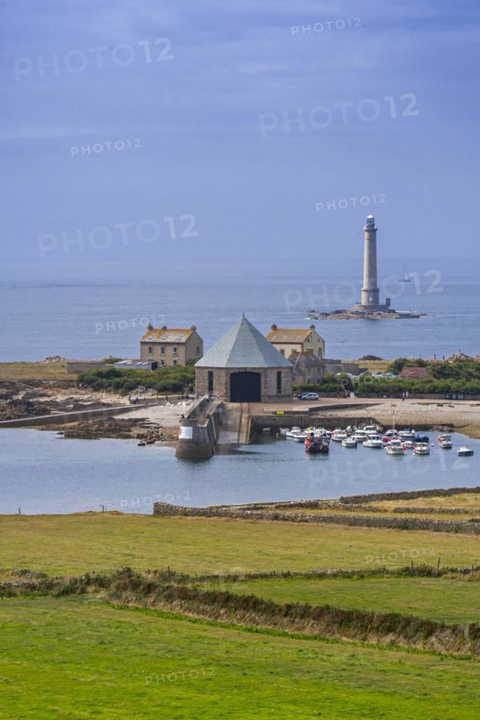Phare de Goury lighthouse and lifeboat station in the port near Auderville at the Cap de La Hague