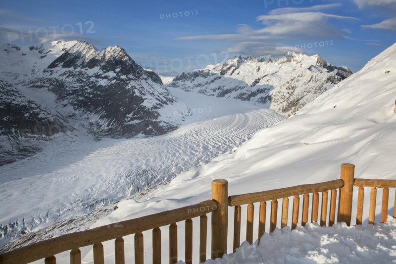 View over the mountains in winter surrounding the Swiss Aletsch Glacier