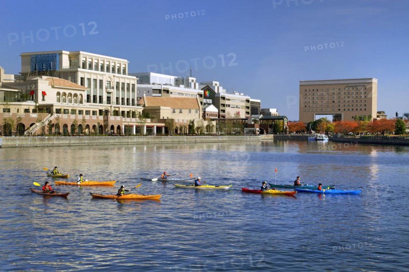 Group of kayaks on excursion in Minato Mirai 21 MM Yokohama city Kanagawa Japan