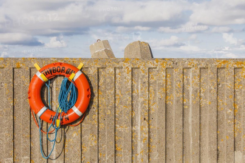 Lifebelt on concrete wall