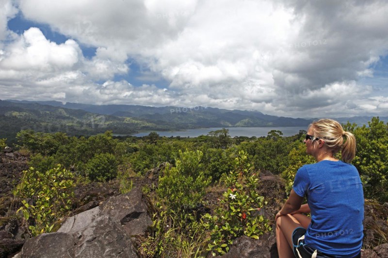 Woman looking at Lake Arenal