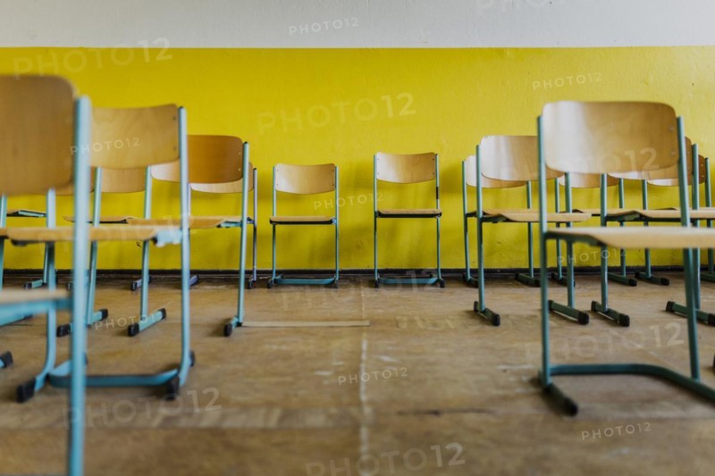 Chairs standing in a classroom of the old primary school in Trinwillershagen