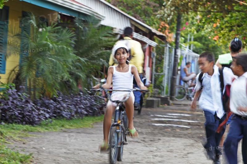 Costa Rican girl on a bicycle