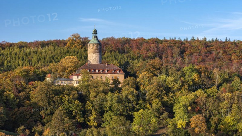 Tonndorf Castle surrounded by forest in autumn