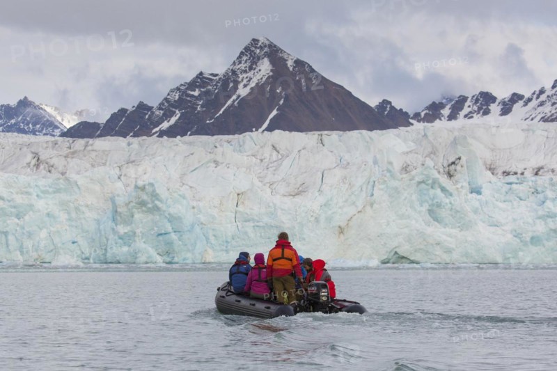 Eco-tourists watching Fjortende Julibreen