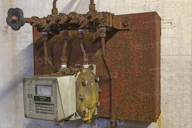 Rusted steam regulator of a former paper factory