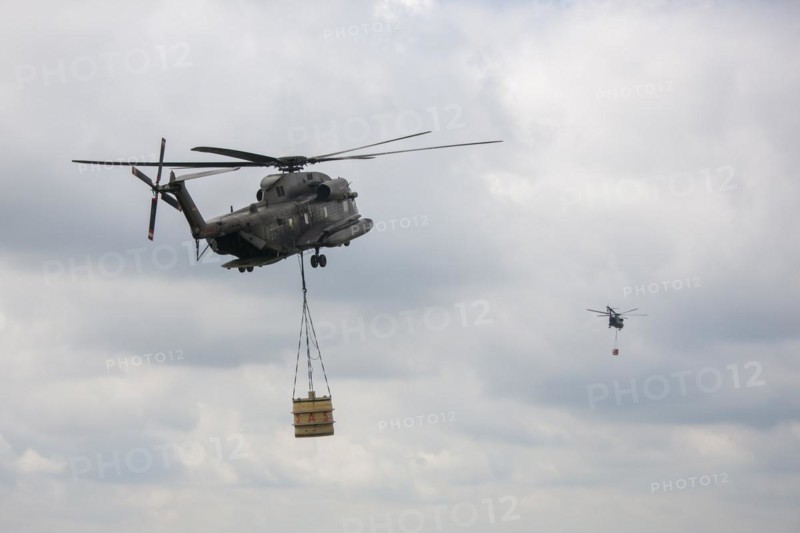 Two Bundeswehr helicopters with fire extinguishing tank 5000 litres
