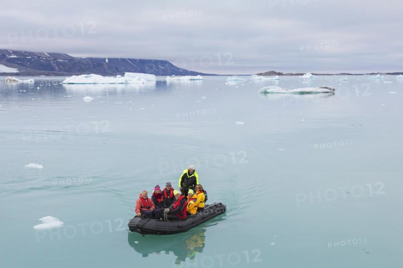 Zodiac boat with eco-tourists visiting Monacobreen
