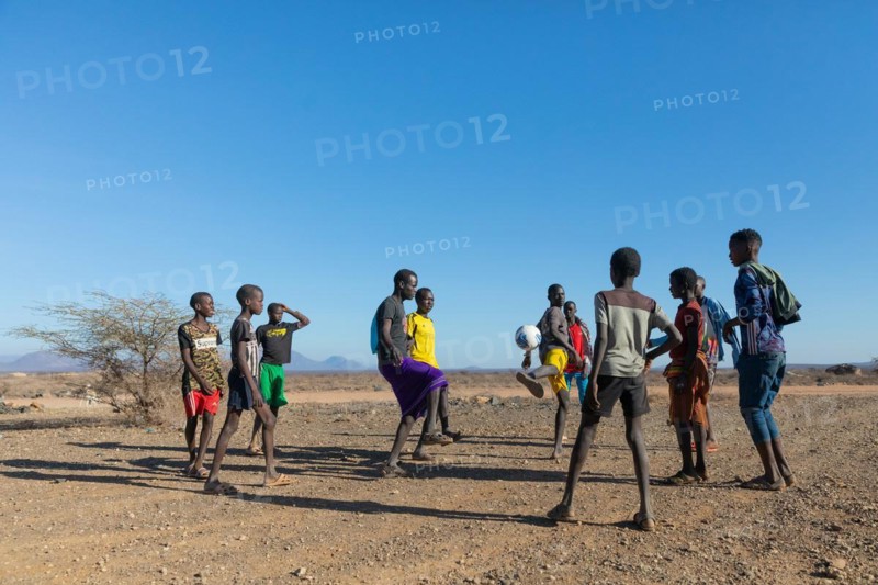 Group of young men playing football