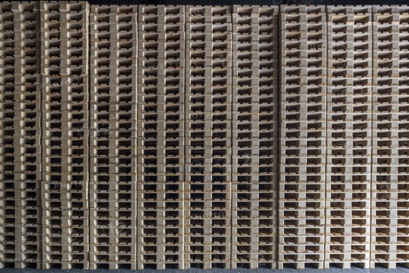 Stacked euro pallets in a former paper factory
