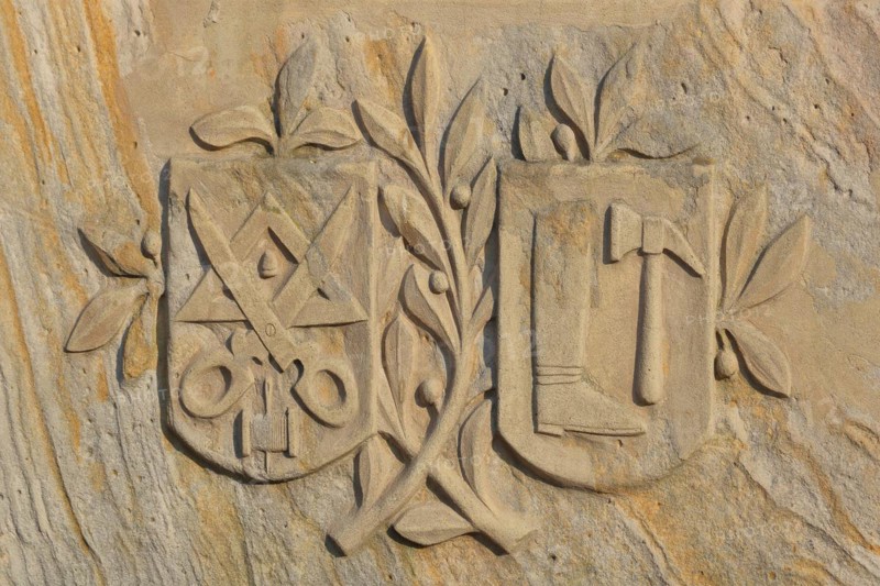 Historical guild coat of arms of the tailors and shoemakers