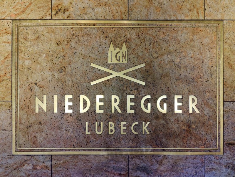 Niederegger company logo on the floor in the entrance area