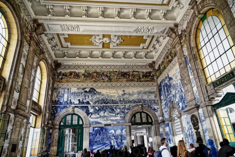 View of azulejos on walls of ornate interior of Arrivals Hall at Sao Bento Railway Station in Porto