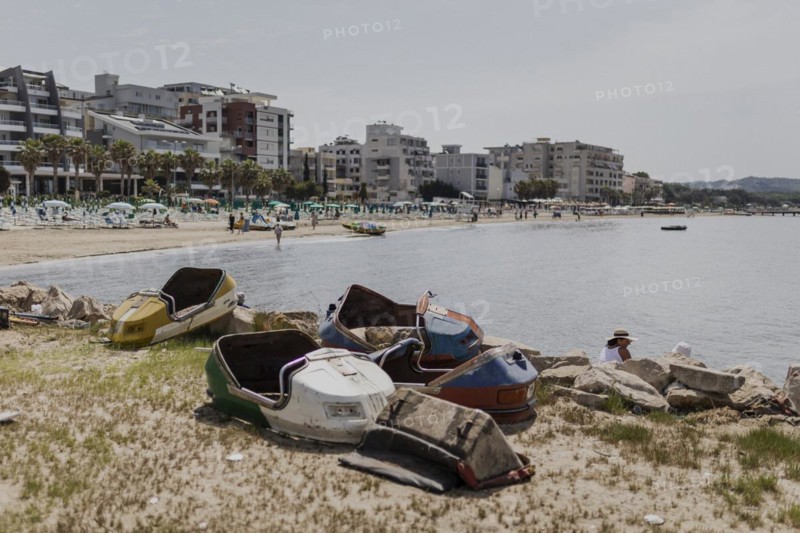 Broken bumper cars standing on the beach of Durres