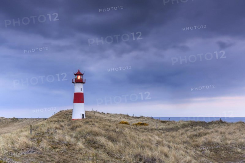 Red and white striped lighthouse List East