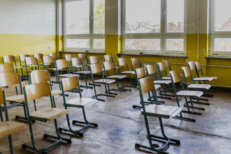 Chairs standing in a classroom of the old primary school in Trinwillershagen