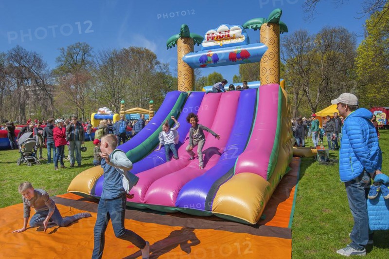 Inflatable plastic slide in springtime Luitpoldpark