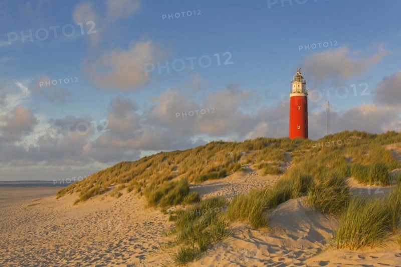 Eierland Lighthouse in the dunes on the northernmost tip of the Dutch island of Texel