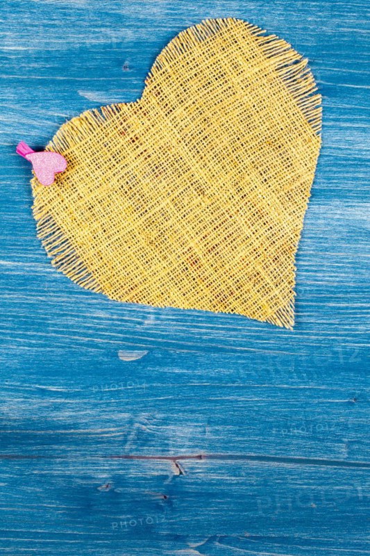 Linen heart on blue background
