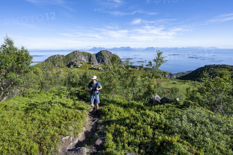 Hikers on trail to Dronningsvarden or Stortinden