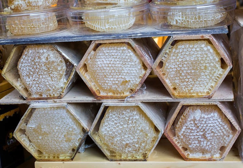 Sweet fresh honey in the sealed comb frame