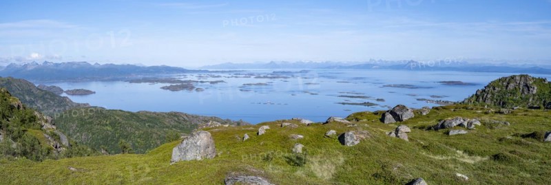 View of sea with archipelago islands from Svellingsflaket and mountains